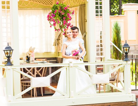Young beautiful wedding couple enjoying romantic moments.の写真素材