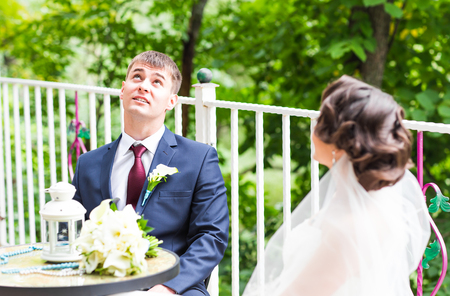 beautiful gorgeous  bride and stylish groom  on the restaurant terrace.の写真素材