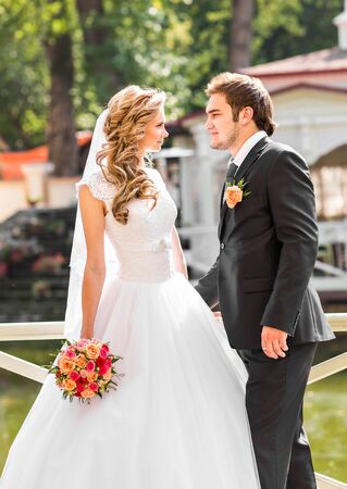 Just married couple embraced. Wedding couple, bride and groomの写真素材
