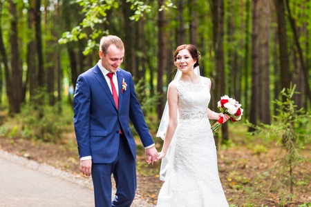 Beautiful wedding couple is enjoying wedding. Bride and groomの写真素材