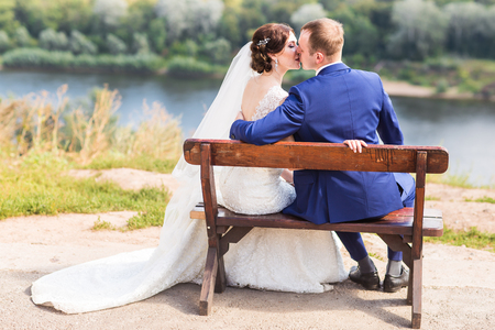 Bride and groom having a romantic moment on their wedding day.の写真素材