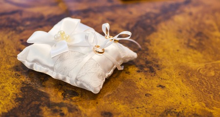 Two gold wedding rings, jewelry for weddingの写真素材