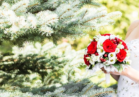 nise fresh wedding bouquet in bride's hand.の写真素材