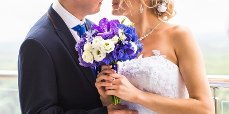 nise fresh wedding bouquet in bride's hand.の写真素材