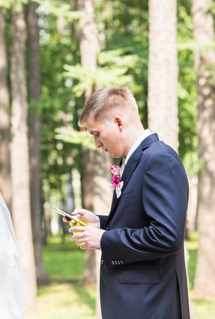 Sexy man in tuxedo and  tie posing.の写真素材