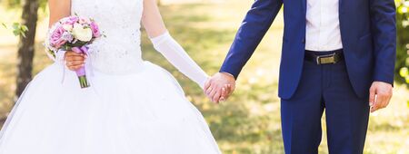 Just married couple outdoors. Wedding couple, newlywedsの写真素材