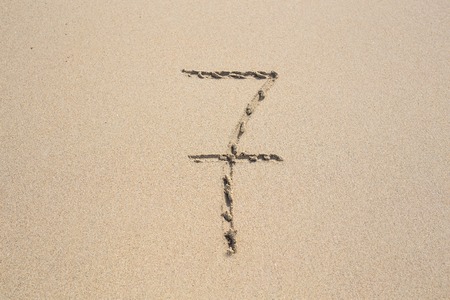 Number seven on the Sand. Concept holiday backgroundの写真素材
