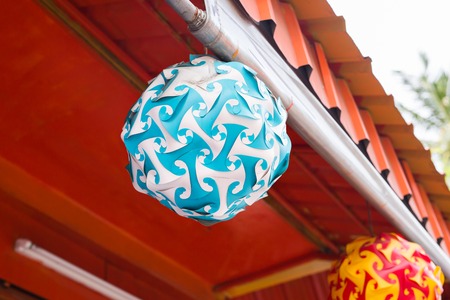Two coloured hanging decorative paper honeycomb ballの写真素材