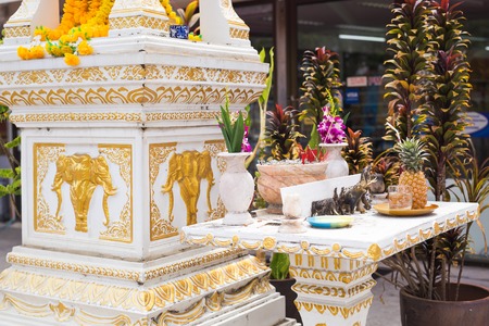 spirit house in thailand with garland and some wreathes, joss houseの写真素材