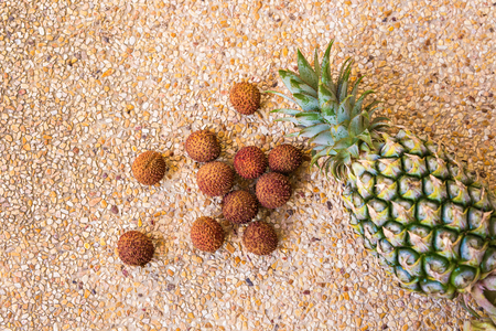 Ripe pineapple lying on a table, fruitの写真素材