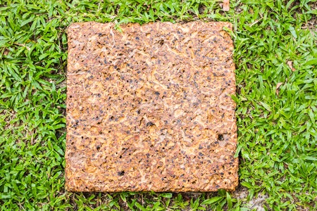 Stone veneer of a wall. Stone texture of warm colours.の写真素材