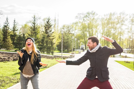 Happy couple having fun and fooling around. Joyful man with woman have nice time. Good relationshipの写真素材