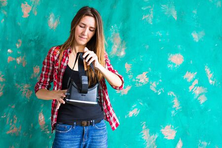 Woman in virtual reality helmet. VR glassesの写真素材