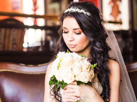 Portrait of a beautiful bride with wedding makeup.の写真素材