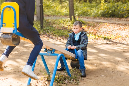 Children playing on a school playground during recessの写真素材
