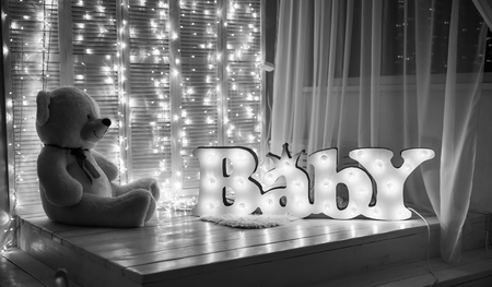 light, beautiful nursery with a teddy bearの写真素材
