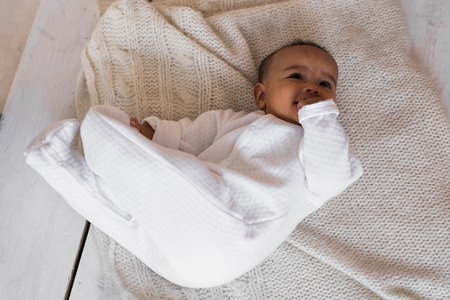 African American Baby Boy Lying Baby Boy Lying On Tummy At Homeの写真素材