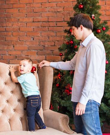 father and son in Christmas home. Happy familyの写真素材