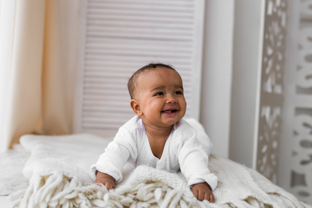 Adorable little african american baby boy laughing - Black people.の写真素材