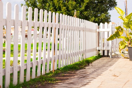 White fence in perspectiveの写真素材