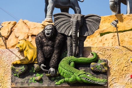 Sculpture of jungle animals - elephant, gorilla, crocodileの写真素材