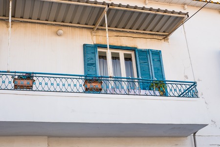 balcony and beautiful flowers in potsの写真素材