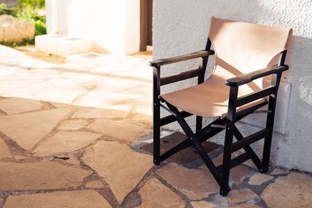 Outdoor furniture. Chair in hotel garden invite you to relaxの写真素材