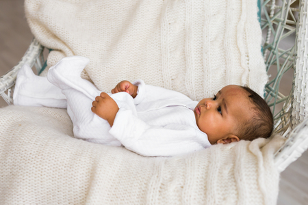 Portrait of a mixed race baby boyの写真素材