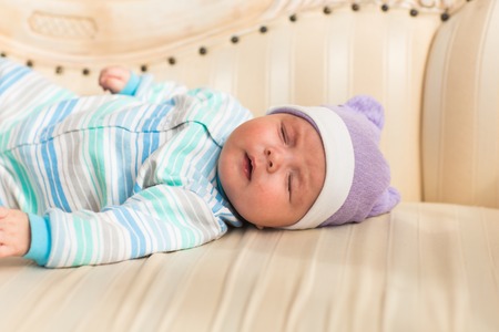 close-up portrait of a beautiful sleeping newborn babyの写真素材