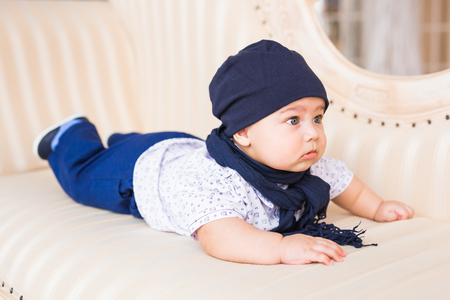 Portrait of cute baby boy wearing blue hat.の写真素材