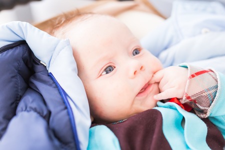 Cute baby boy, closeup portrait of adorable child, sweet toddler with blue eyes, healthy childhood,...