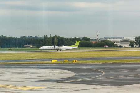 PRAGUE, CZECH REPUBLIC - JUNE 16, 2017: Boeing of Air Baltic airlines landing at Vaclav Havel Prague International Airport, Ruzyne, Czech Republic.のeditorial素材