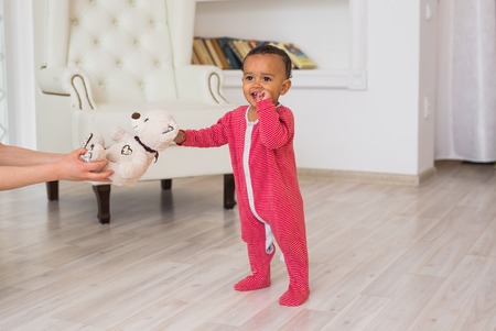 Portrait of a little african american baby boy playing indoorの写真素材