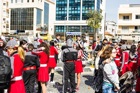 LIMASSOL, CYPRUS - FEBRUARY 26: Happy people in teams dressed with colorfull costumes at famous Limassol Carnival Parade, February 26, 2017 in Limassolのeditorial素材