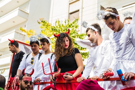 LIMASSOL, CYPRUS - FEBRUARY 26: Happy people in teams dressed with colorfull costumes at famous Limassol Carnival Parade, February 26, 2017 in Limassolのeditorial素材