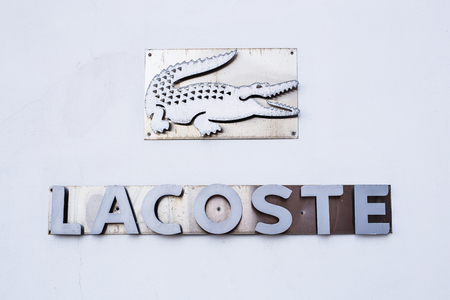 AYIA NAPA, CYPRUS - FEBRUARY 19, 2017: The logo of the brand Lacosteのeditorial素材