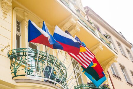 Flags of the World in front of a Buidingの写真素材