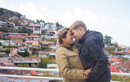 couple kissing each other in autumn. concept about passion and love