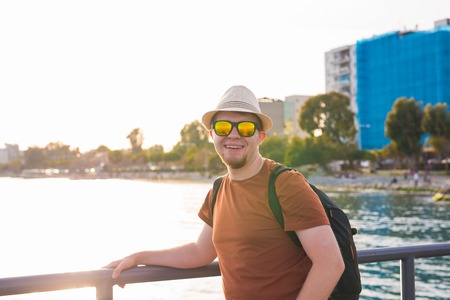 Portrait of an attractive young man on a tropical beachの写真素材