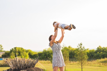 Happy father and son portrait playing together having funの写真素材