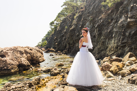 Beautiful young bride on natureの写真素材