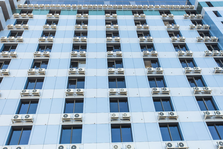 Wall with many air-conditioners, The outside of a buildingの写真素材