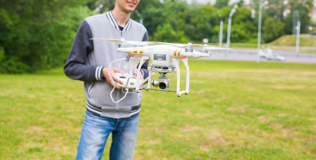 Ufa, Russia. - 6 June 2016 : White drone, quadrocopter with photo camera flyingのeditorial素材