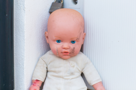 Homeless children, orphans and child abuse - Broken and macabre dolls.の写真素材