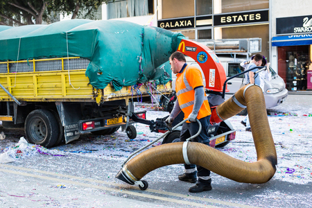 Limassol, Cyprus. - 26 February 2017 - Street sweeper machine cleaning the street after a carnival partyのeditorial素材