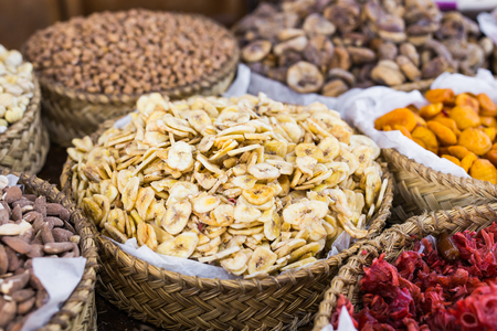 Baskets with a variety of delicious nutsの写真素材