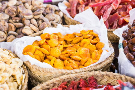 Dried fruits of various kinds from raisins to apricots.