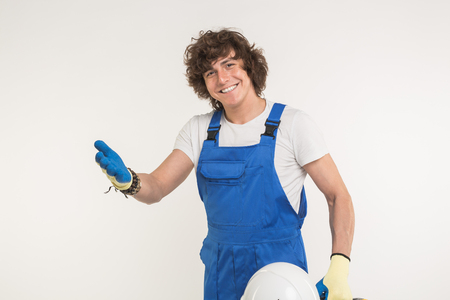 Portrait of happy handsome male builderの写真素材