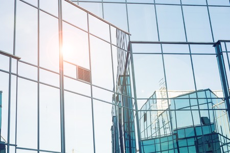 Sunlight reflected on office buildingの写真素材