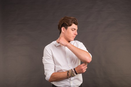 People, style and self-confidence concept - handsome stylish man on brown backgroundの写真素材